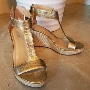 Michael Kors gold wedges